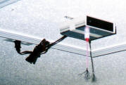 IG-133DGB Ionizer with brackets, mounted on ceiling attic door